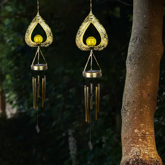 Solar Hanging Lights with Iron Heart Design and Wind Chimes – Waterproof LED Garden Decor for Outdoor Ambiance